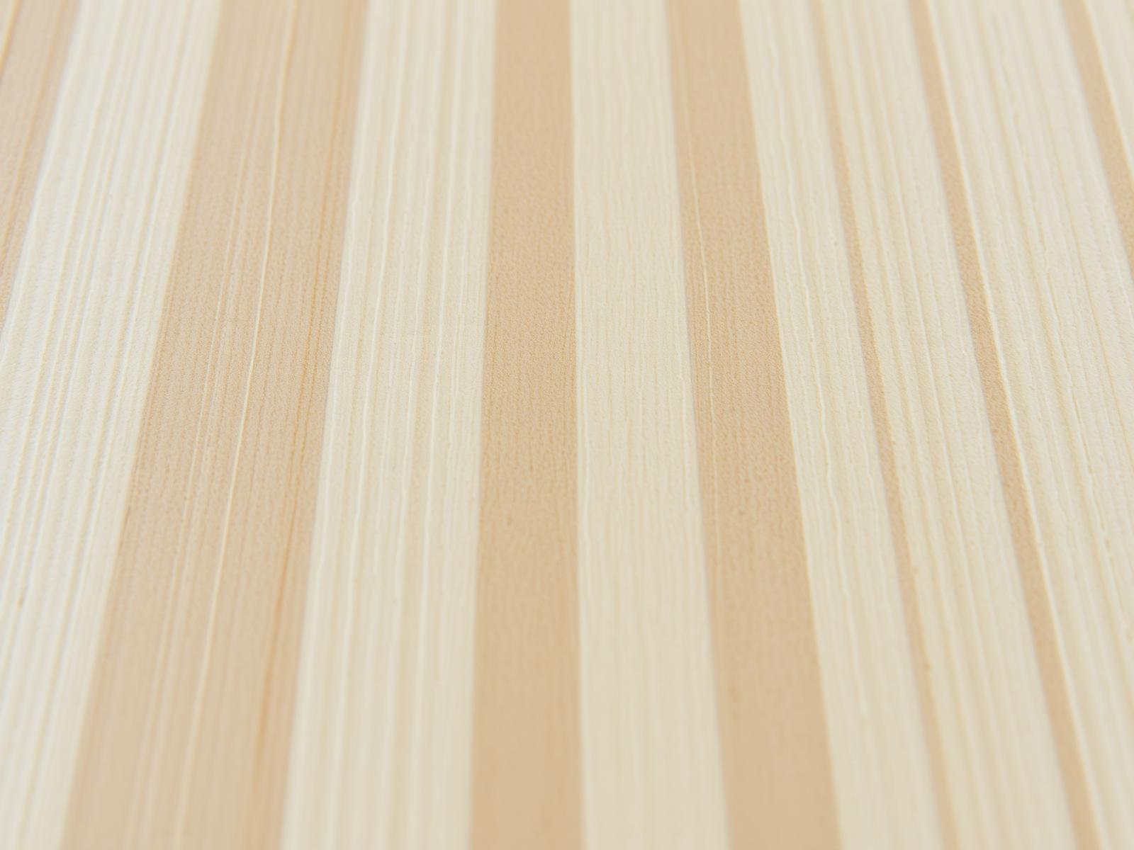 Close-up of edge-glued albasia laminated panel surface